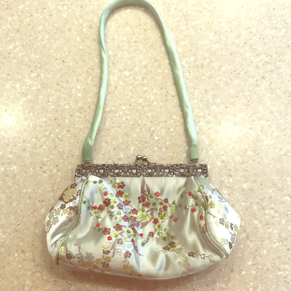 Satin green purse with embroidered sequins